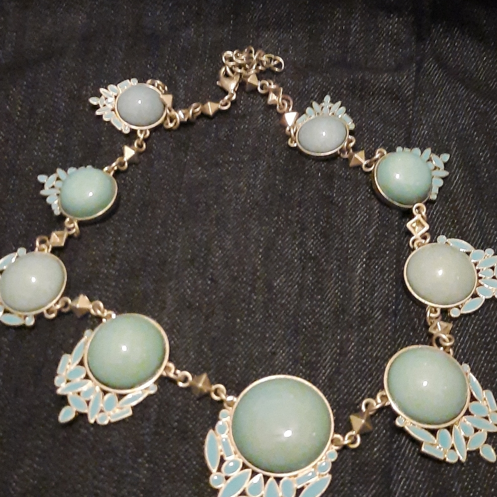 Heidi Klum gold tone and blue stone cor necklace